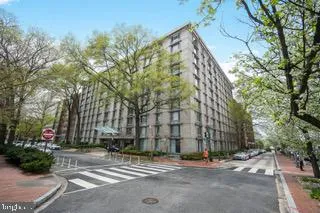 a building with trees in front of it