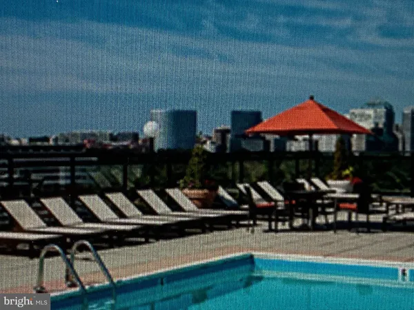 a view of a cafe with sitting area