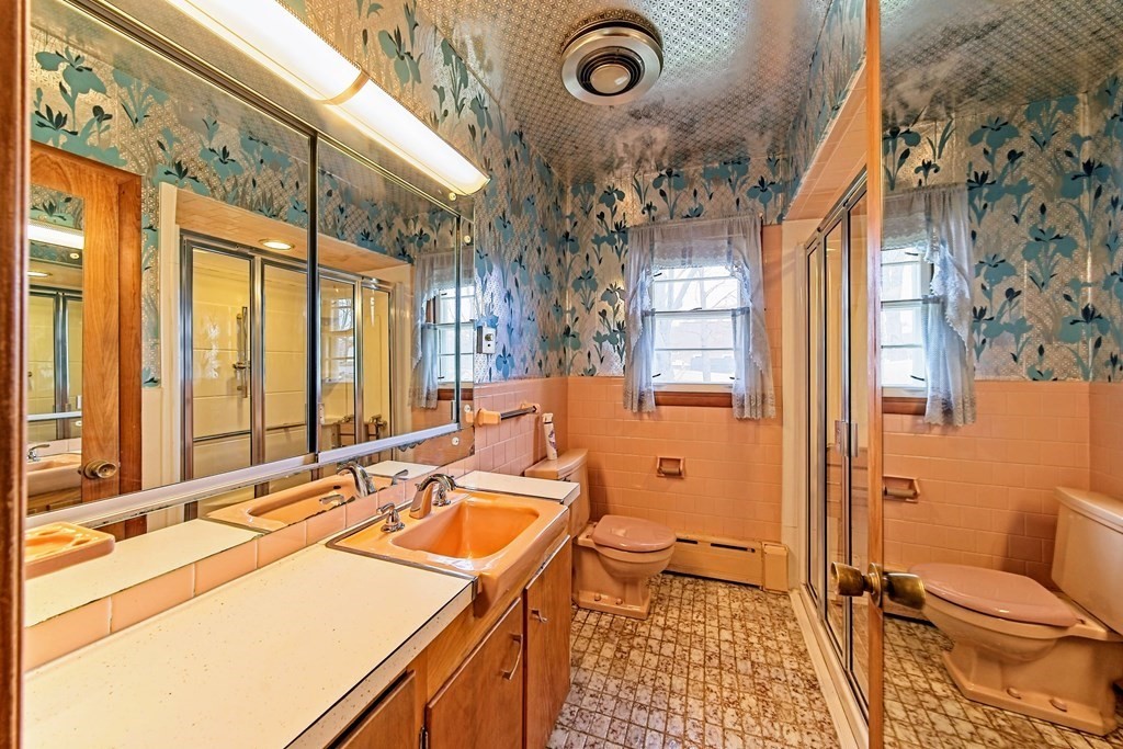274 Kaufman Road Somerset, MA 02726 - Photo 12 of 13 a bathroom with a sink a toilet a mirror and shower