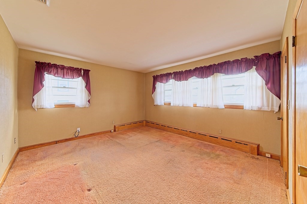 274 Kaufman Road Somerset, MA 02726 - Photo 8 of 13 an empty room with windows