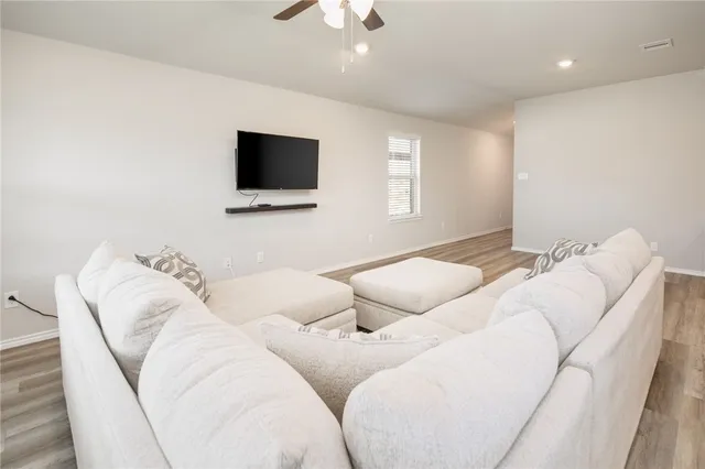 a kitchen with stainless steel appliances kitchen island granite countertop a sink and cabinets
