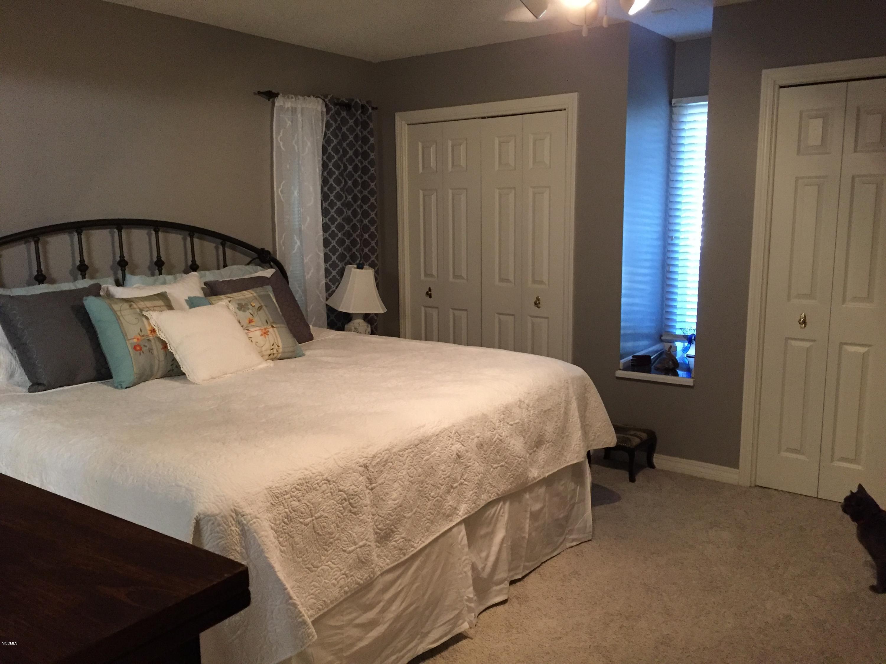 14766 Jim Byrd Road Biloxi, MS 39532 - Photo 24 of 61 master bedroom 3 (2 closets)