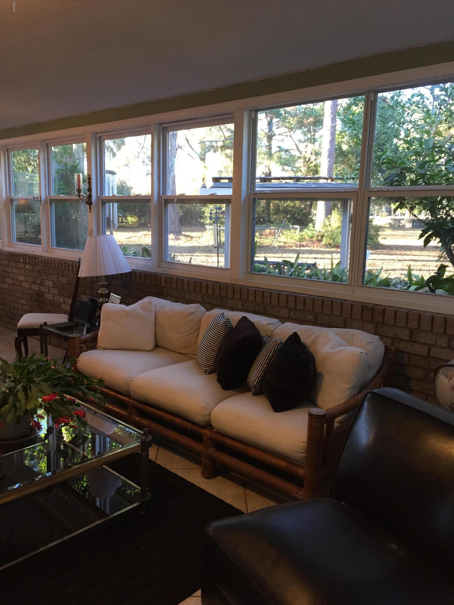 14766 Jim Byrd Road Biloxi, MS 39532 - Photo 31 of 61 sunroom 1 (33'x13')