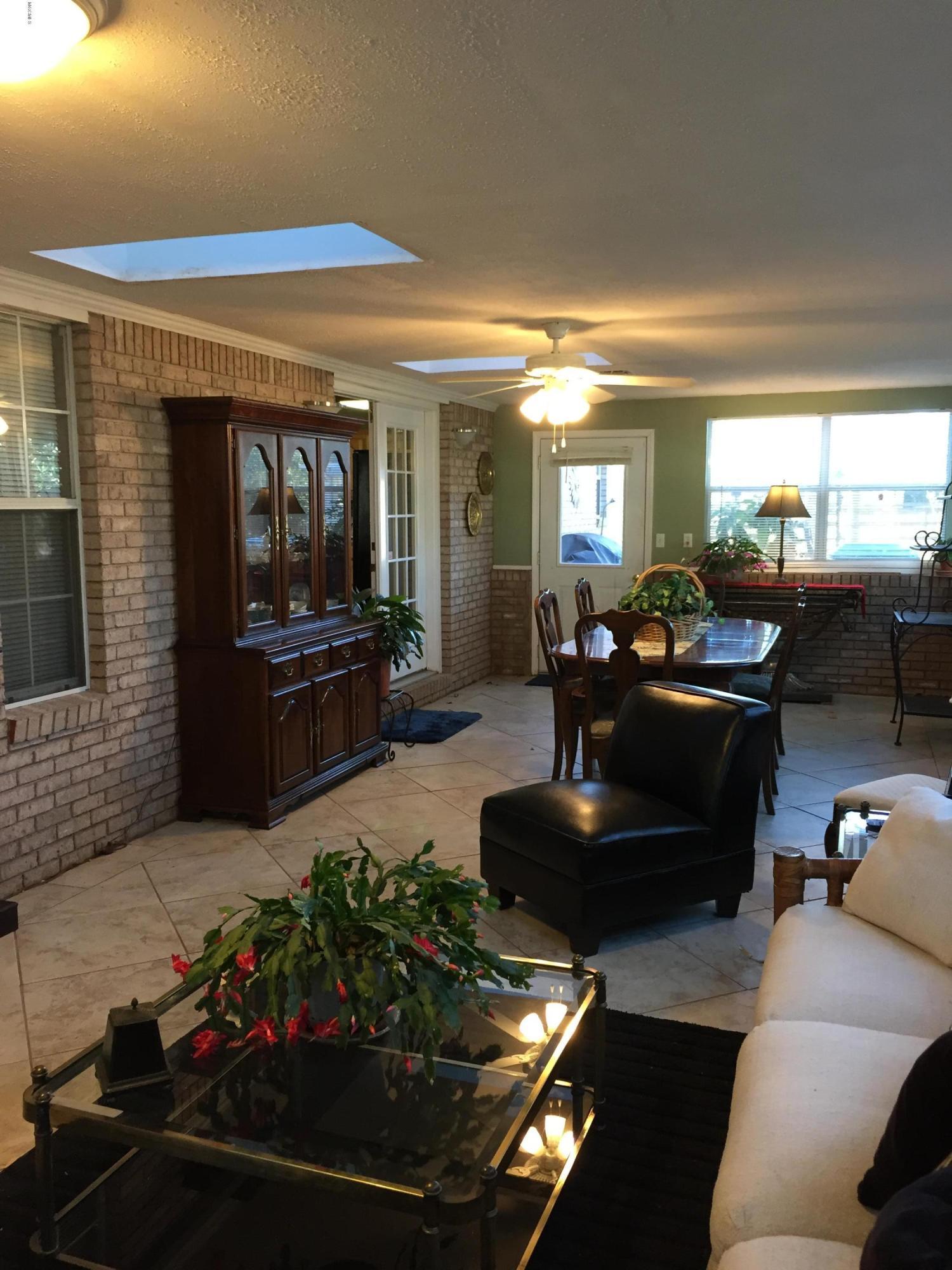 14766 Jim Byrd Road Biloxi, MS 39532 - Photo 32 of 61 sunroom 2 (ceramic tile)