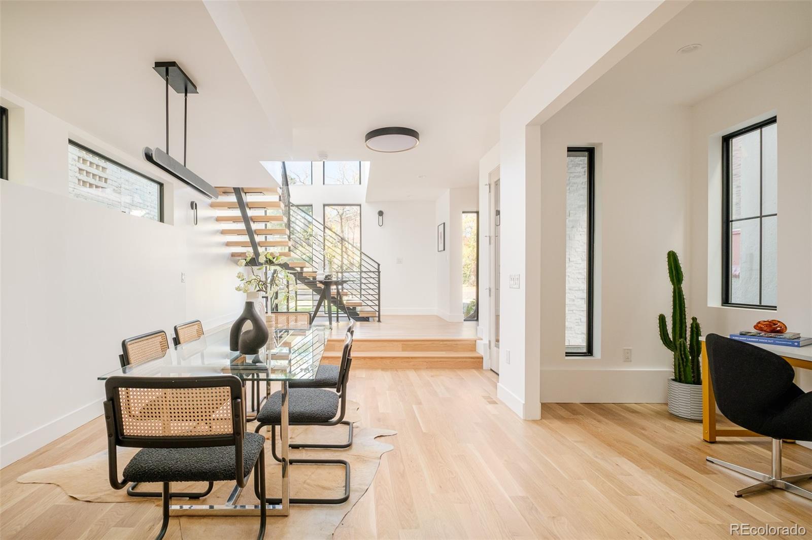 3554 Osage Street Denver, CO 80211 - Photo 15 of 40 a view of a livingroom with furniture and wooden floor