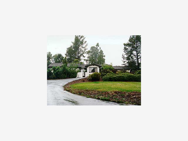 520 Poppy Hill Road Watsonville, CA 95076 - Photo 1 of 1 a view of a backyard