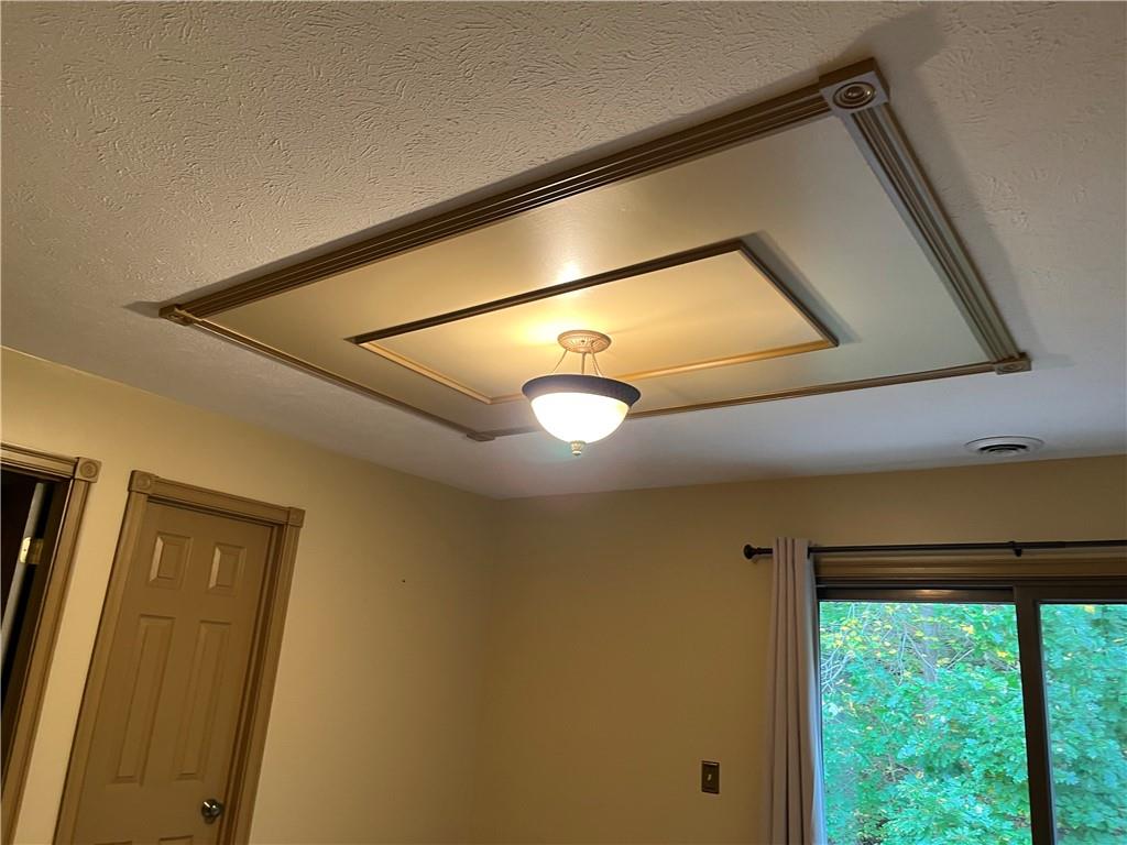 345 Duck Hollow Road Uniontown, PA 15401 - Photo 11 of 25 a view of staircase with a projector and a window