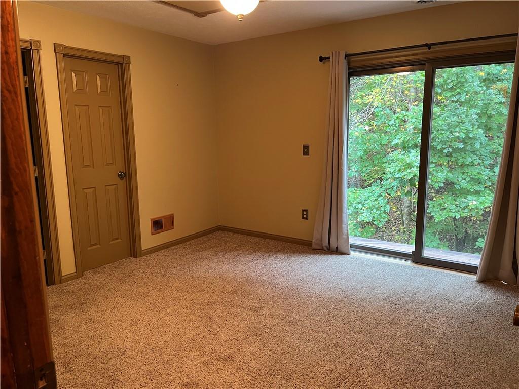345 Duck Hollow Road Uniontown, PA 15401 - Photo 12 of 25 a view of empty room with a large window