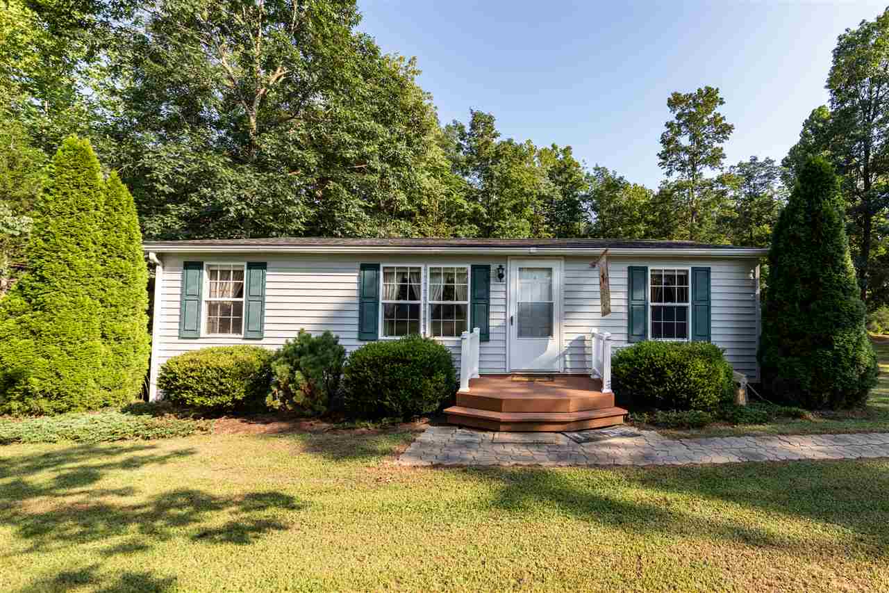 1365 George Walton Road Mount Solon, VA 22843 - Photo 1 of 28 a front view of a house with a garden