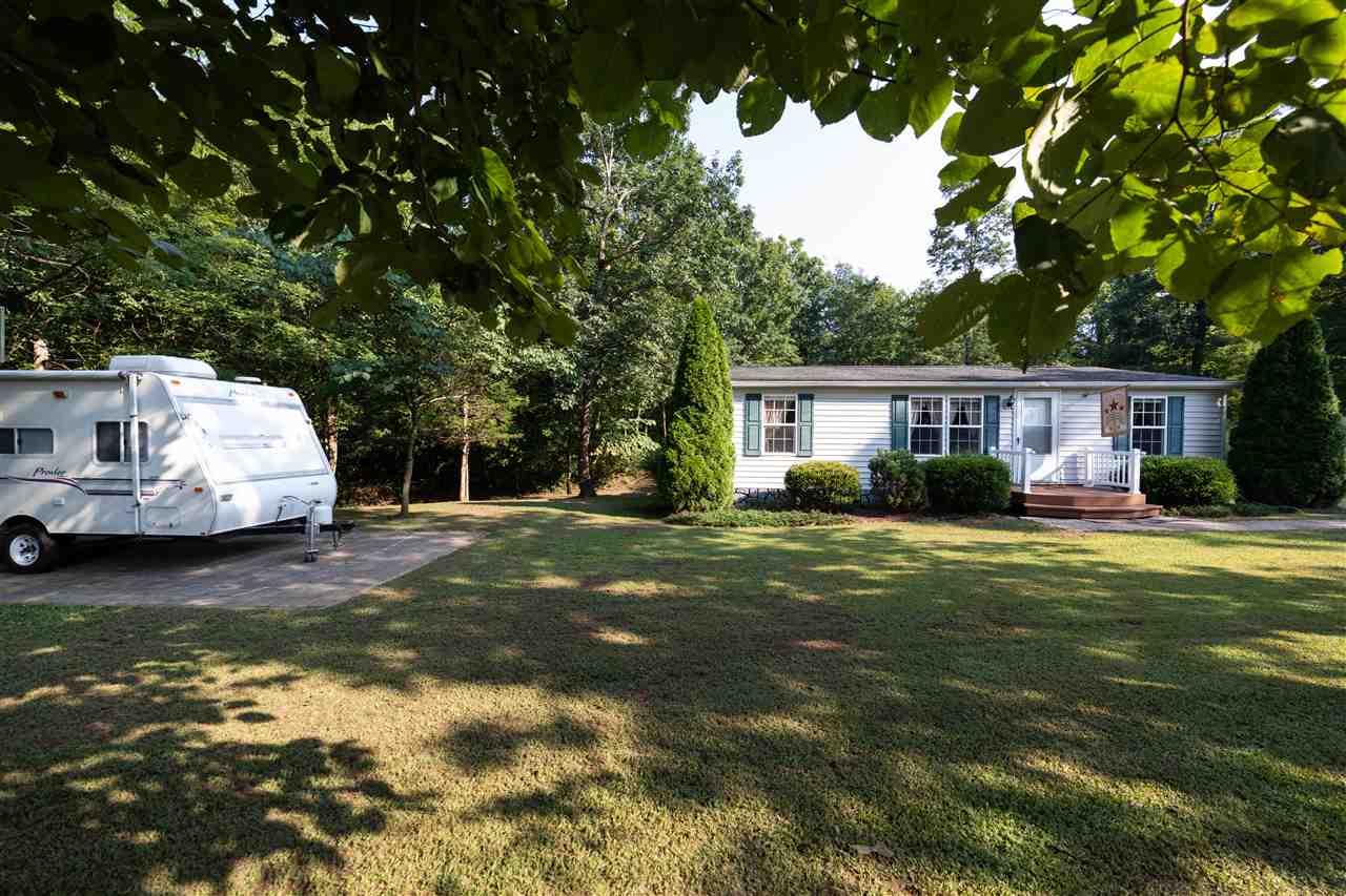 1365 George Walton Road Mount Solon, VA 22843 - Photo 4 of 28 a view of a house with pool and chairs