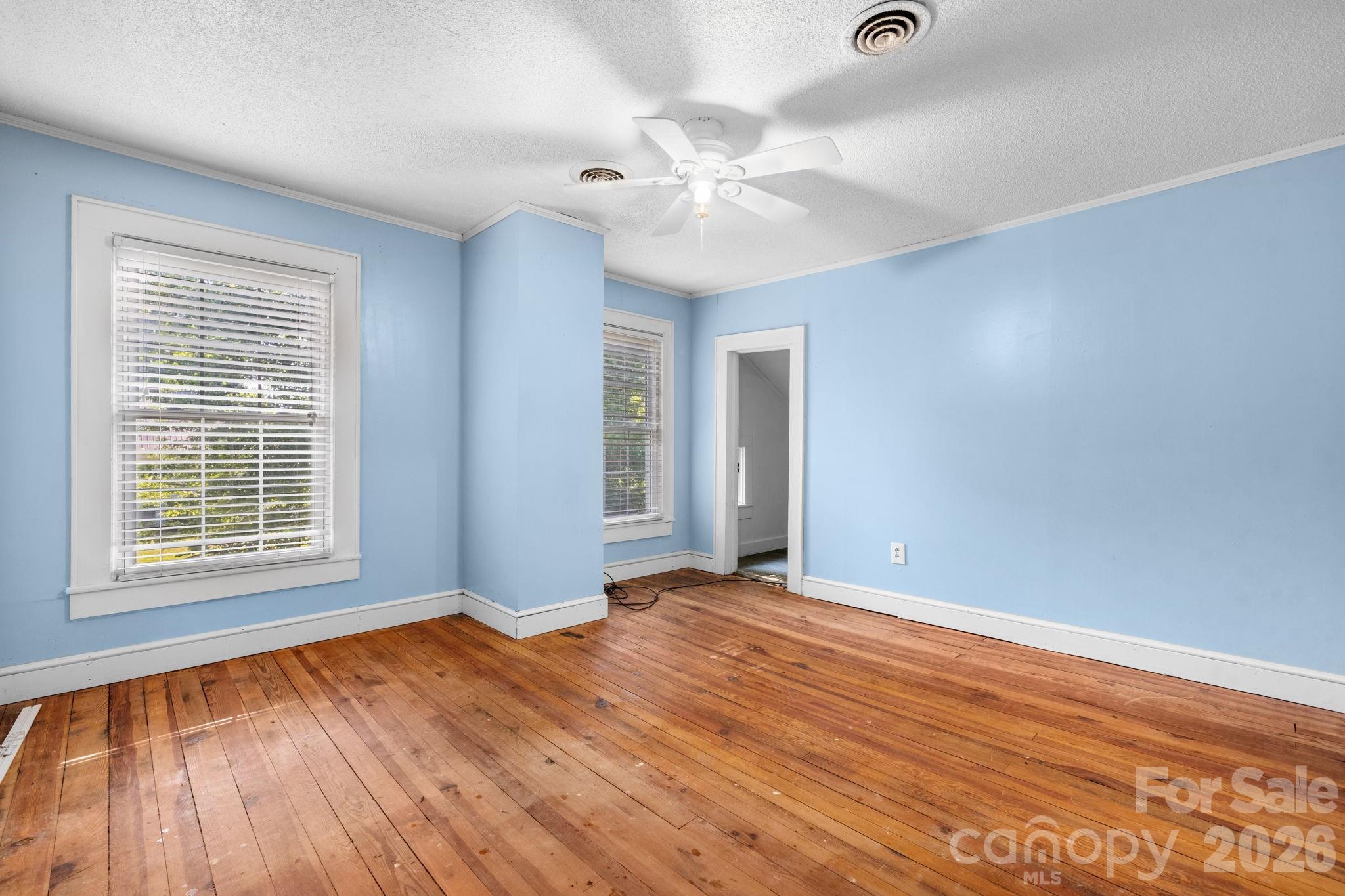 144 Hunter Bridge Road Stony Point, NC 28678 - Photo 24 of 45 wooden floor in an empty room with a window