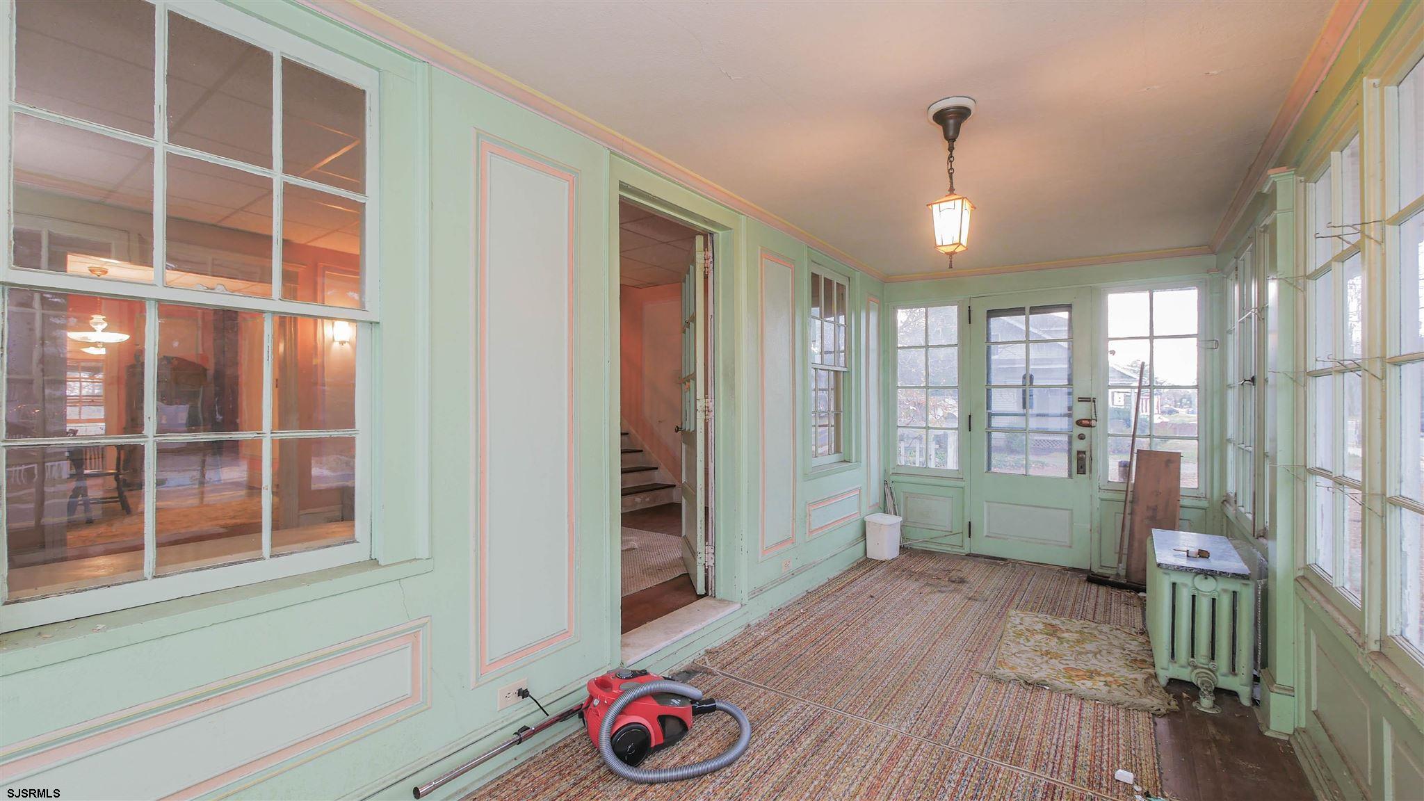 1414 Shore Road Northfield, NJ 08225 - Photo 3 of 19 a view of livingroom with furniture and windows