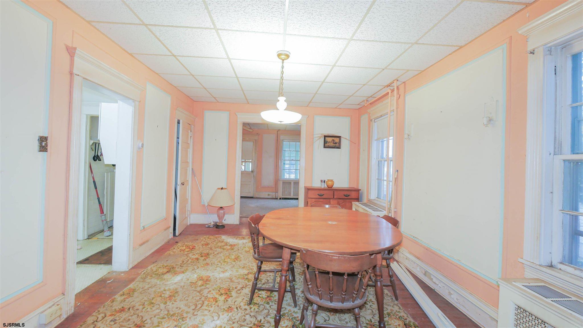 1414 Shore Road Northfield, NJ 08225 - Photo 6 of 19 a view of a dining room with furniture window and wooden floor