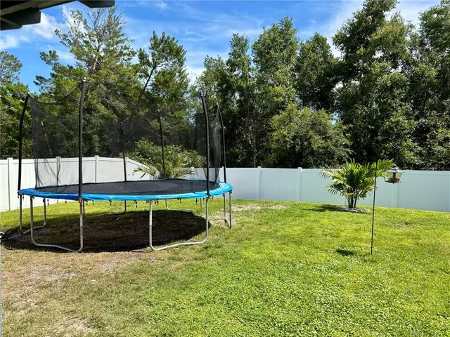 a view of a dinning tables and chairs in the patio