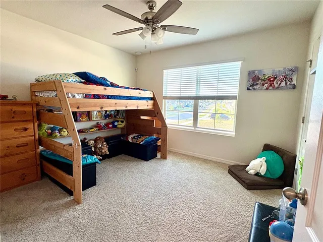 a bathroom with a double vanity sink mirror and