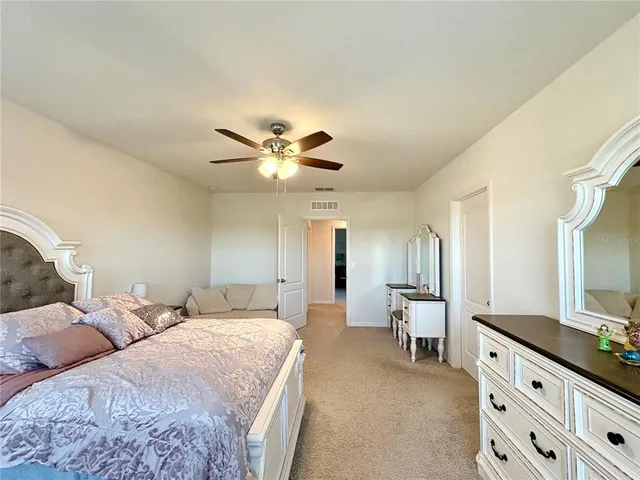 a view of a bathroom with a glass door and a shower
