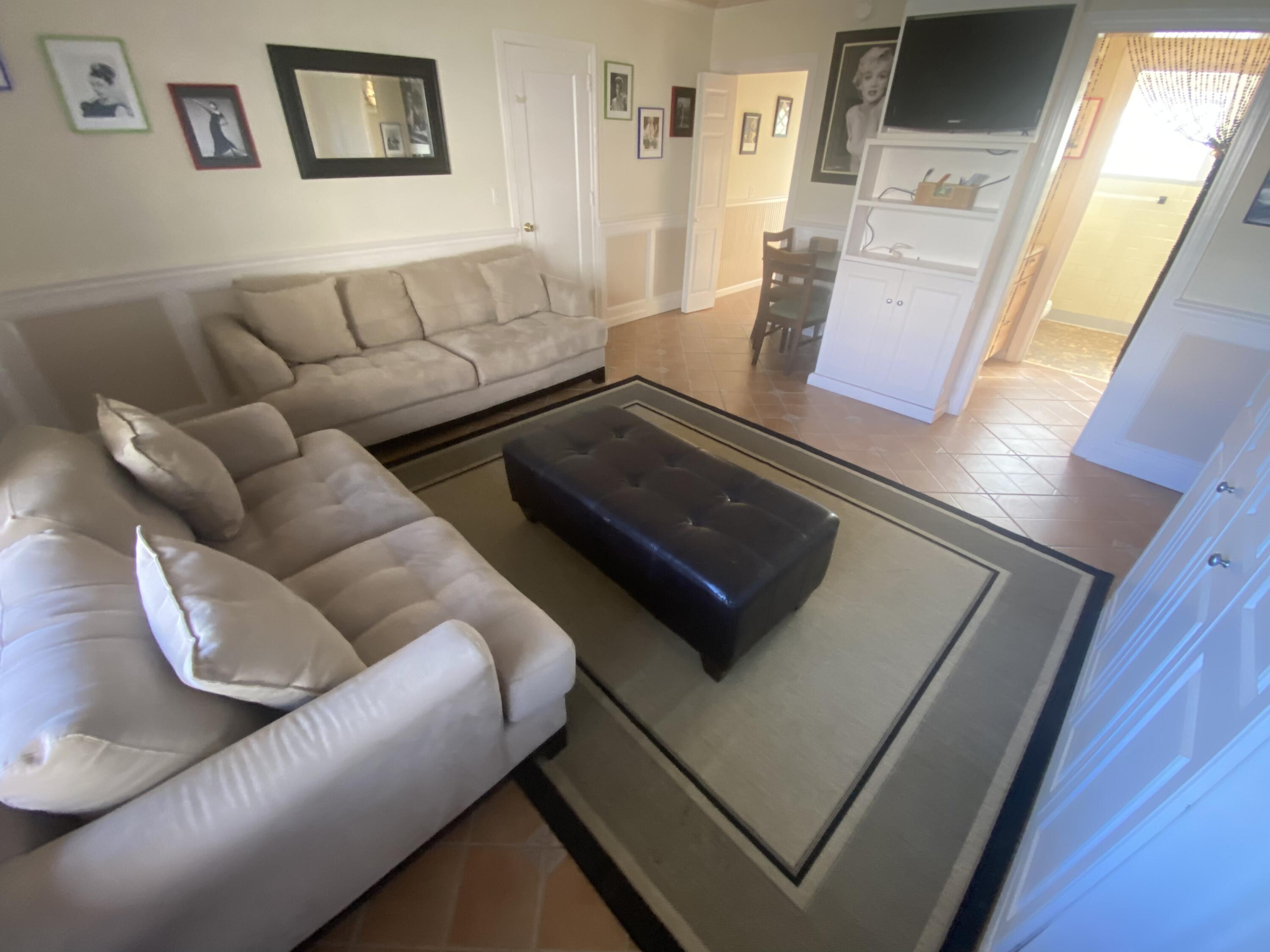 101 South Golfview Road, Unit 5 Lake Worth Beach, FL 33460 - Photo 12 of 17 a living room with furniture and a rug