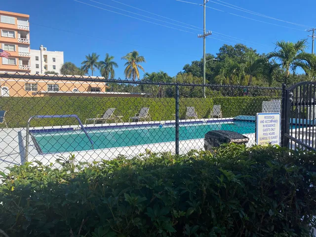 a view of a lake with a building in the background