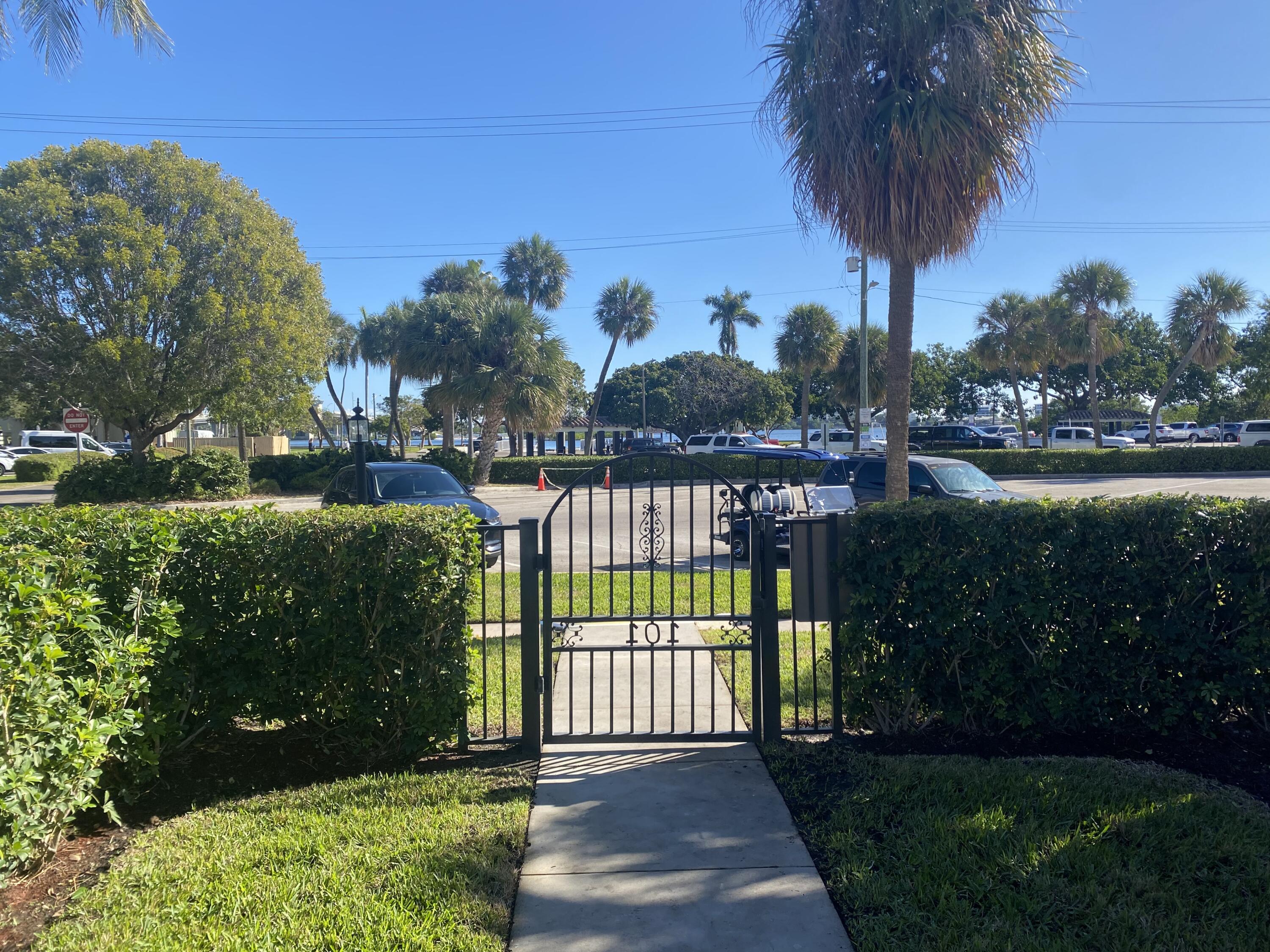 101 South Golfview Road, Unit 5 Lake Worth Beach, FL 33460 - Photo 4 of 17 a view of a park with a garden