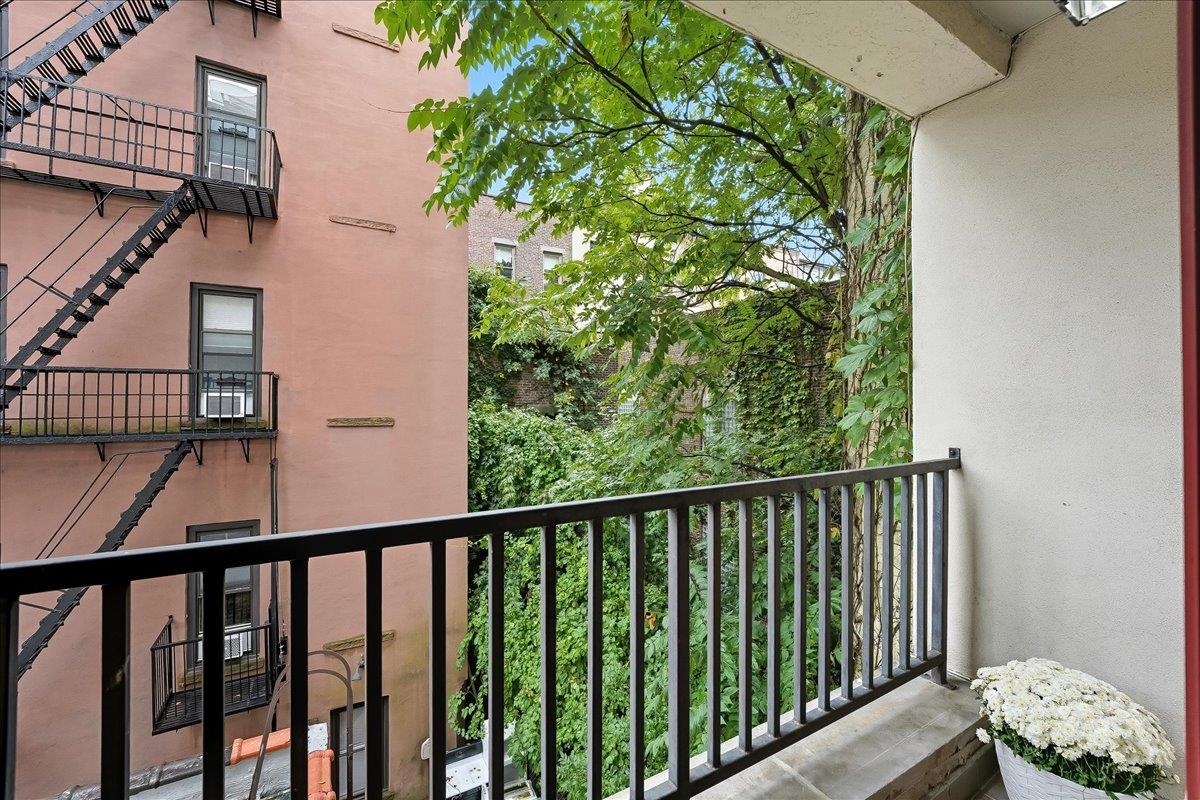 829 Washington Street, Unit 8 Hoboken, NJ 07030 - Photo 29 of 36 a view of balcony with wooden floor