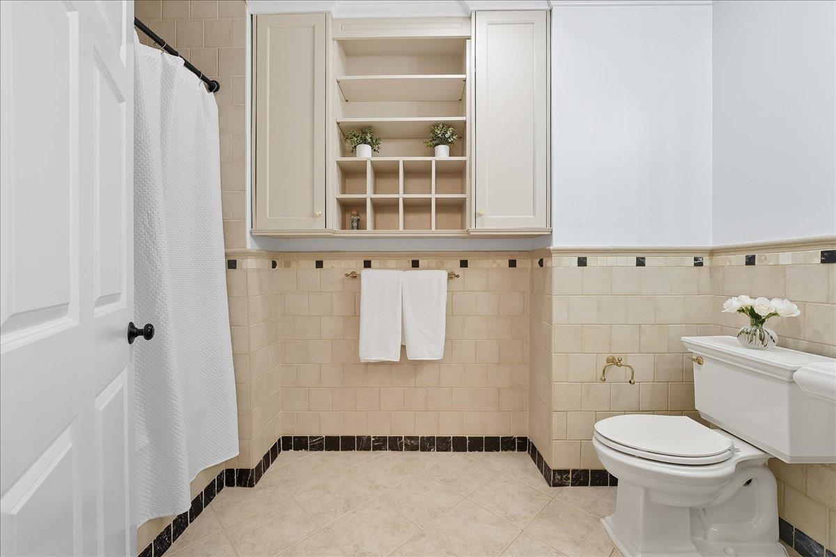 829 Washington Street, Unit 8 Hoboken, NJ 07030 - Photo 30 of 36 a bathroom with a toilet and a shower