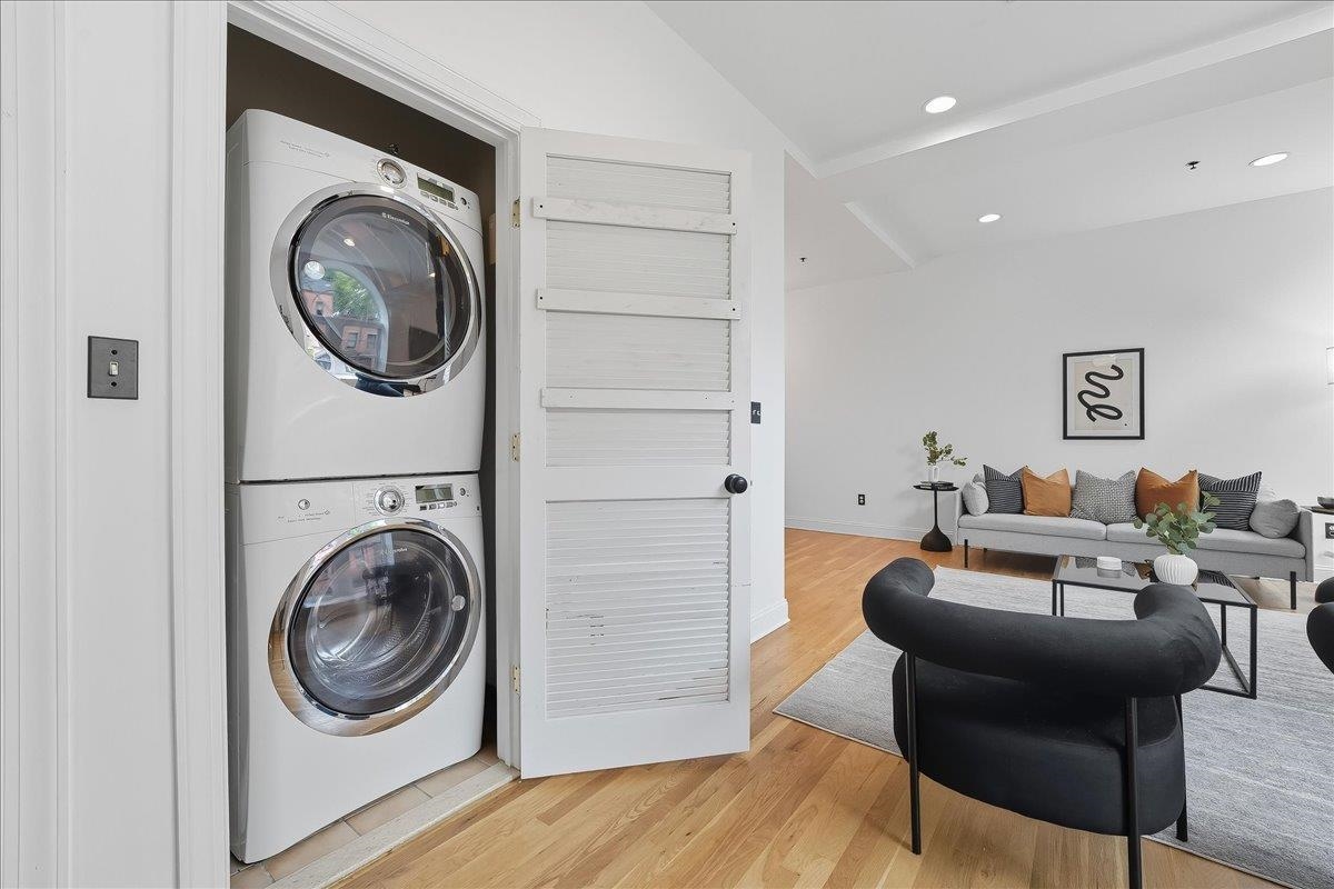 829 Washington Street, Unit 8 Hoboken, NJ 07030 - Photo 32 of 36 a living room with furniture and a washing machine