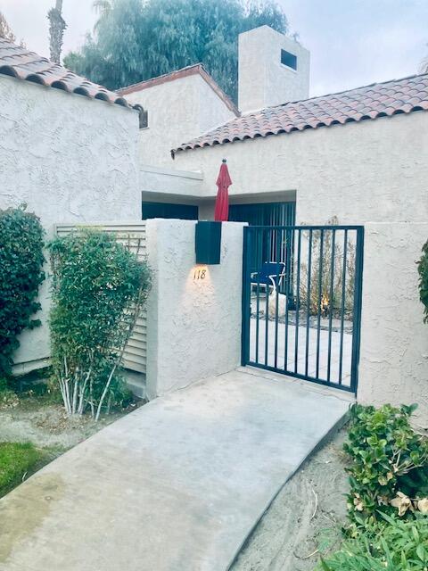118 Racquet Club Drive South Rancho Mirage, CA 92270 - Photo 20 of 33 front view of a house