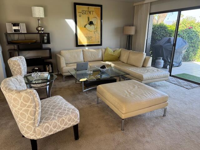 118 Racquet Club Drive South Rancho Mirage, CA 92270 - Photo 27 of 33 a living room with furniture and a large window