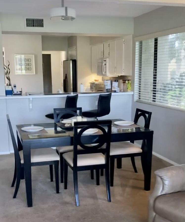 118 Racquet Club Drive South Rancho Mirage, CA 92270 - Photo 8 of 33 a view of a dining room with furniture