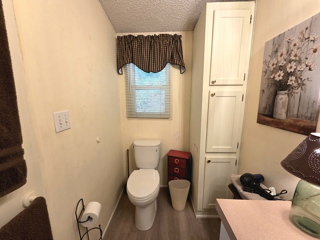72 Holiday Circle Chicopee, MA 01020 - Photo 16 of 16 a bathroom with a toilet and a sink