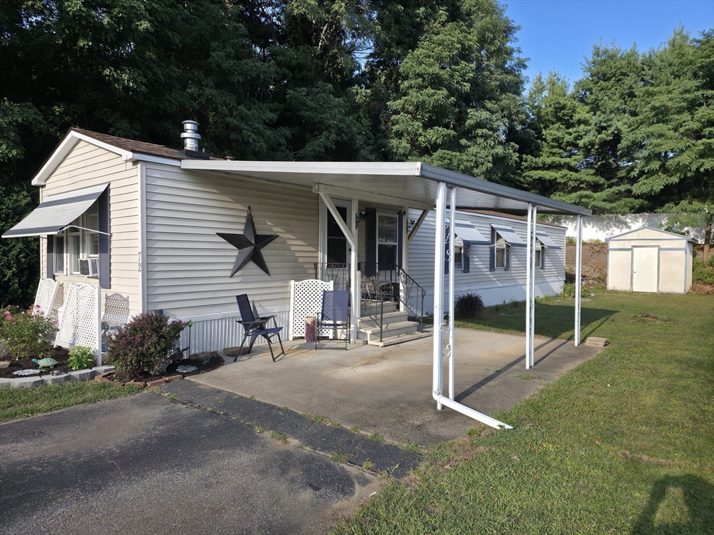 72 Holiday Circle Chicopee, MA 01020 - Photo 2 of 16 a view of a house with backyard