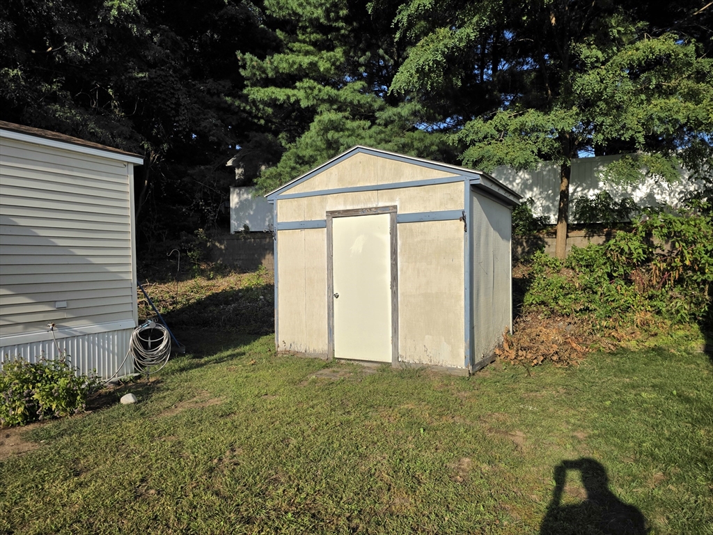 72 Holiday Circle Chicopee, MA 01020 - Photo 4 of 16 a view of backyard with green space