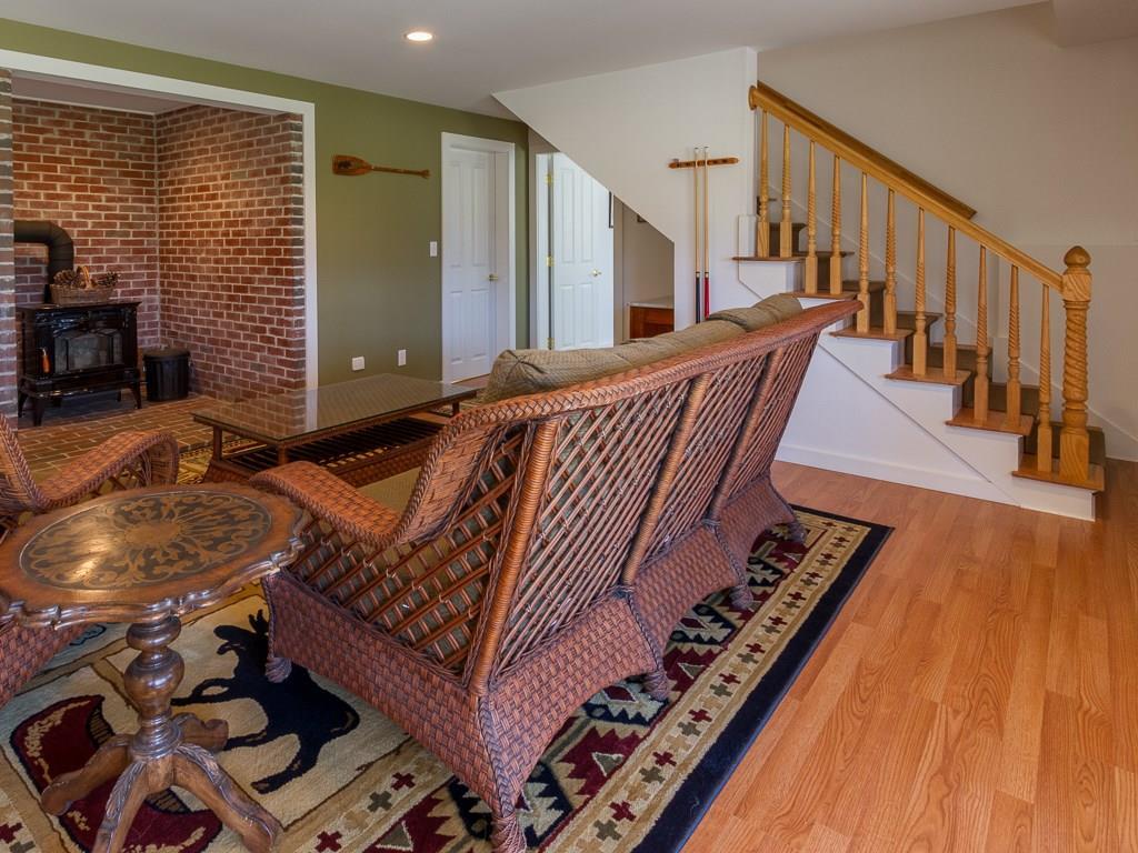 86 Spring Hill Loop Chamberlain, ME 04541 - Photo 20 of 35 Family room in walkout basement.