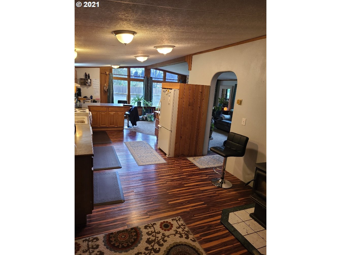 9024 173rd Avenue Southwest Rochester, WA 98579 - Photo 8 of 16 a living room with furniture and a rug