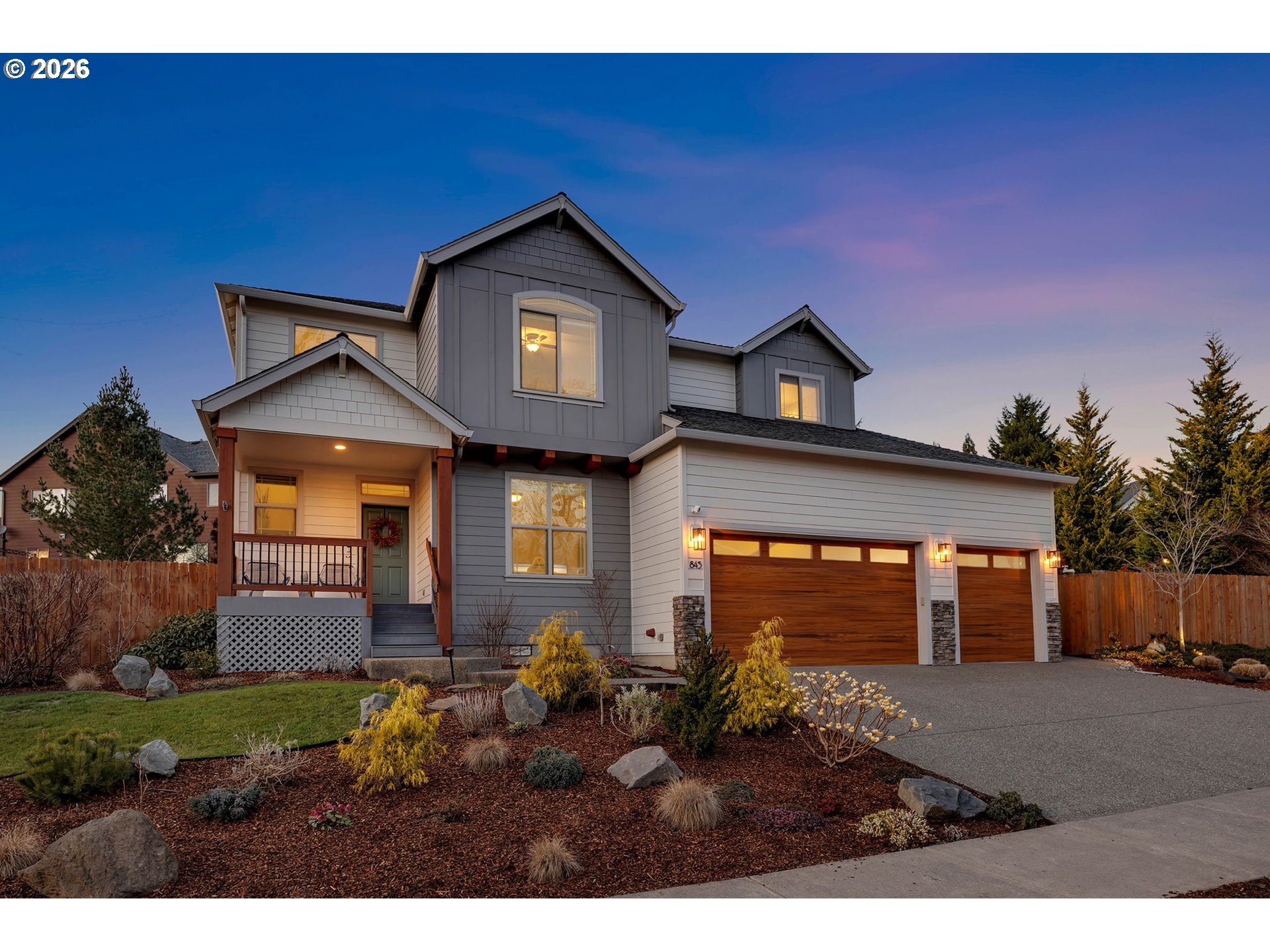 a front view of a house with a yard