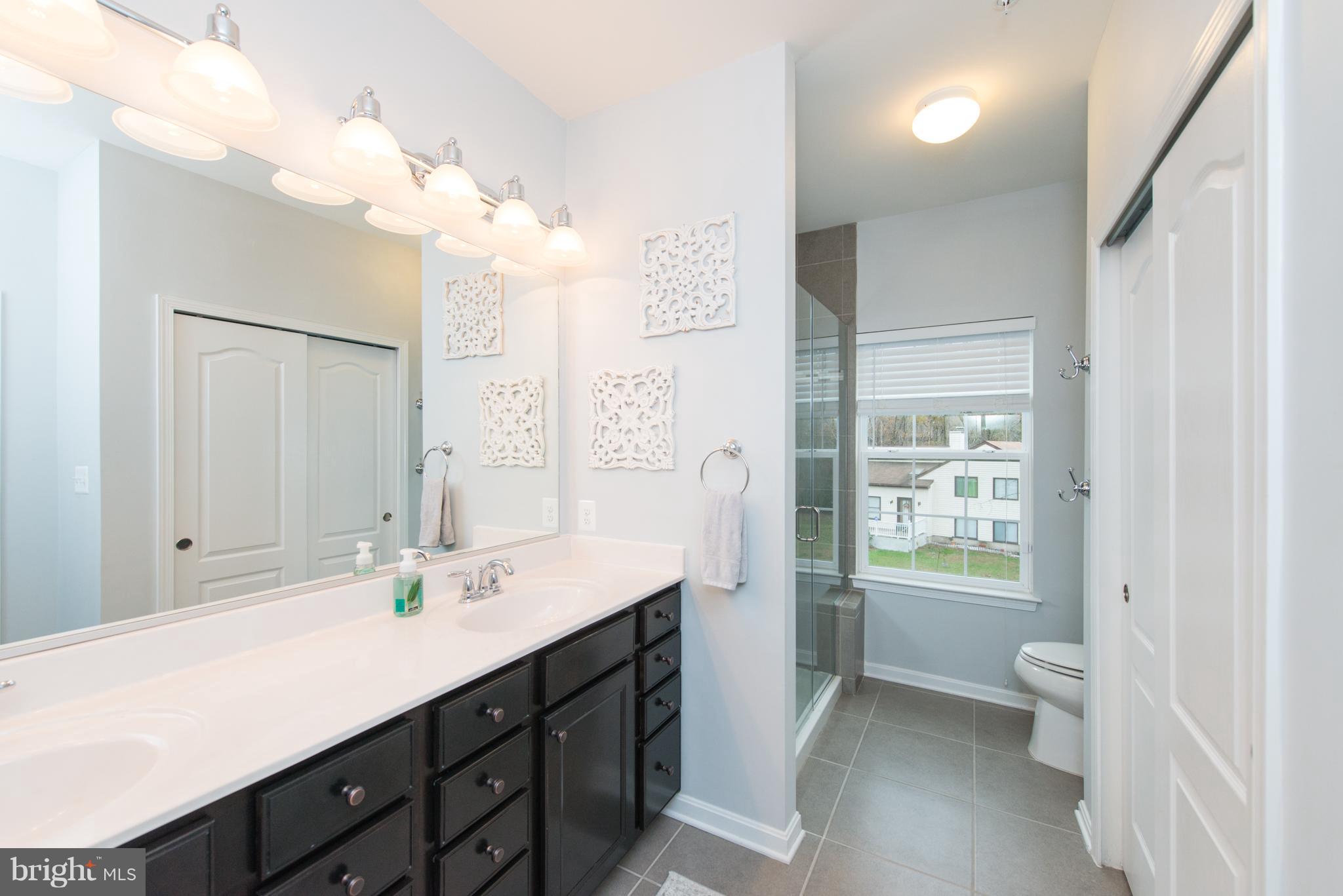 1213 Bradley Road Severn, MD 21144 - Photo 15 of 30 DUAL VANITY W/ 16 DRAWERS OF STORAGE