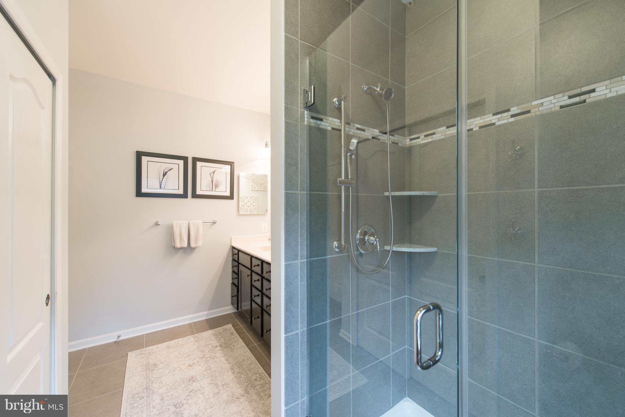 1213 Bradley Road Severn, MD 21144 - Photo 16 of 30 OVER SIZED TILE SHOWER WITH TWO SHOWER HEADS