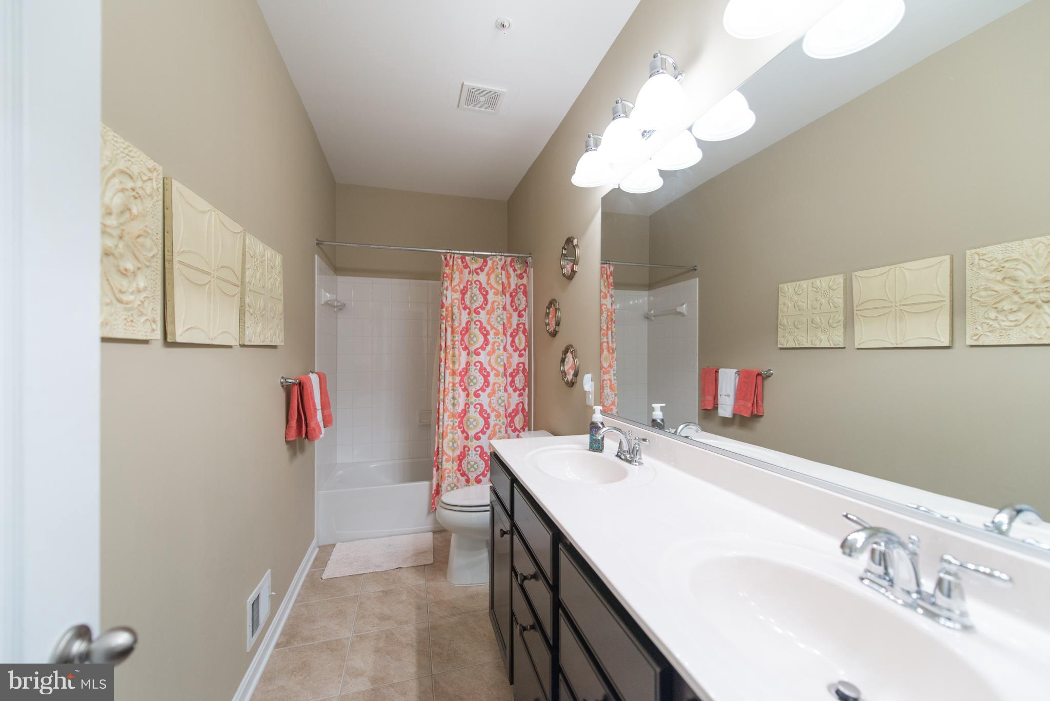 1213 Bradley Road Severn, MD 21144 - Photo 17 of 30 LARGE 2nd BATH W/ DUAL VANITIES & CERAMIC TILE