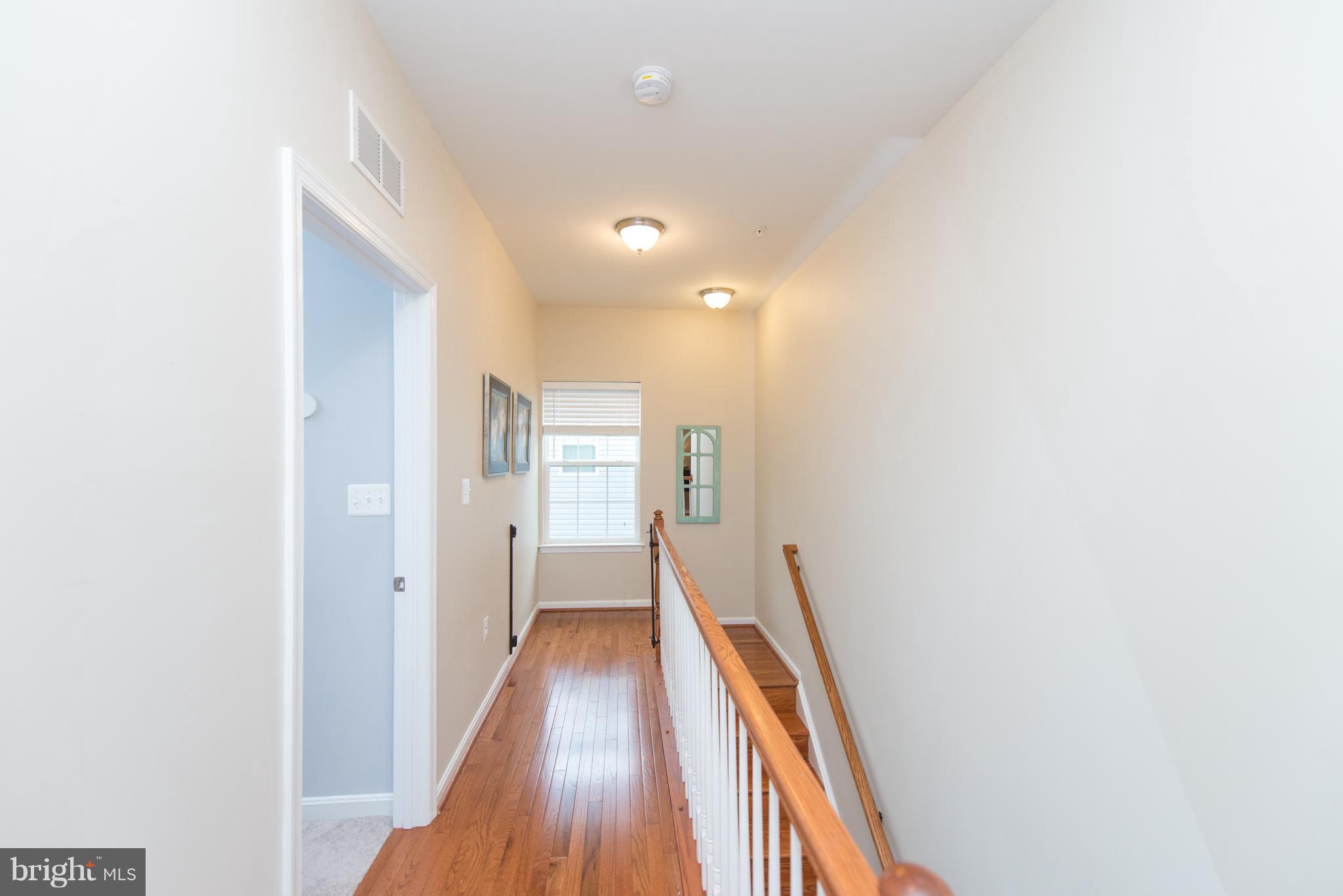 1213 Bradley Road Severn, MD 21144 - Photo 24 of 30 LATER ADDED HARDWOOD ON STEPS AND UPPER HALLWAY