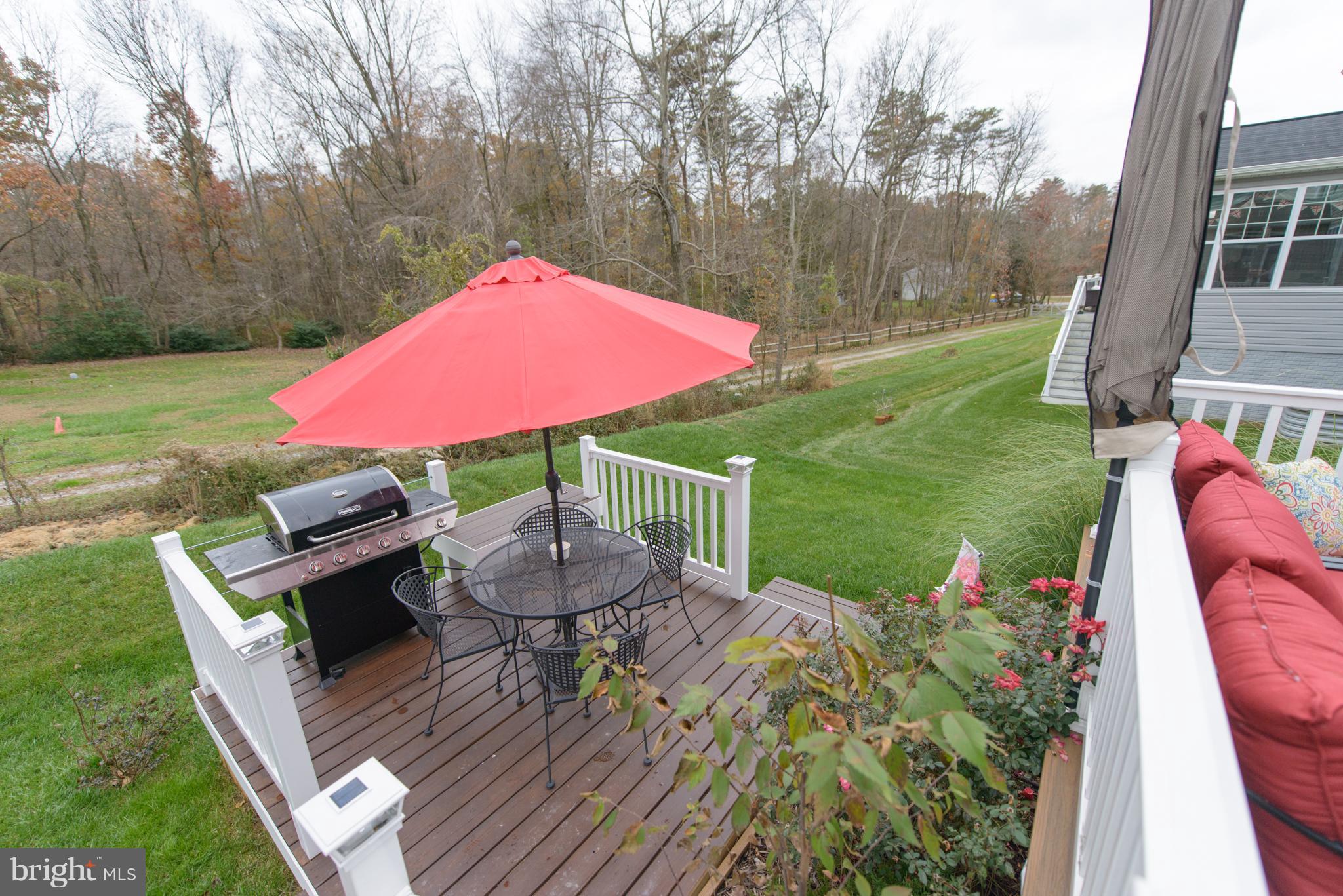 1213 Bradley Road Severn, MD 21144 - Photo 29 of 30 LOWER GRILLING DECK ENTERING THE YARD