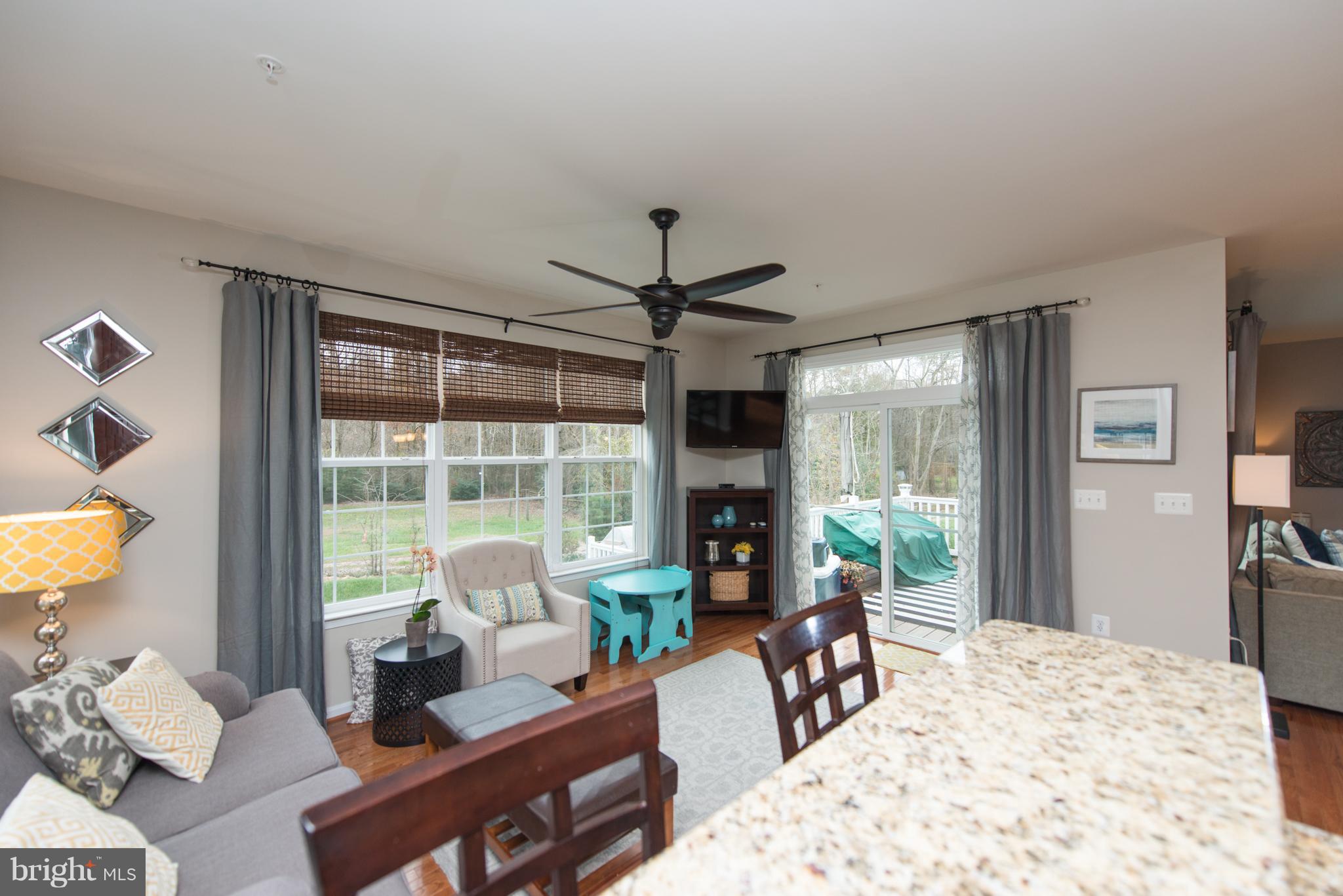 1213 Bradley Road Severn, MD 21144 - Photo 9 of 30 OPENS TO COMPOSITE NO MAINTENANCE TIERED DECK