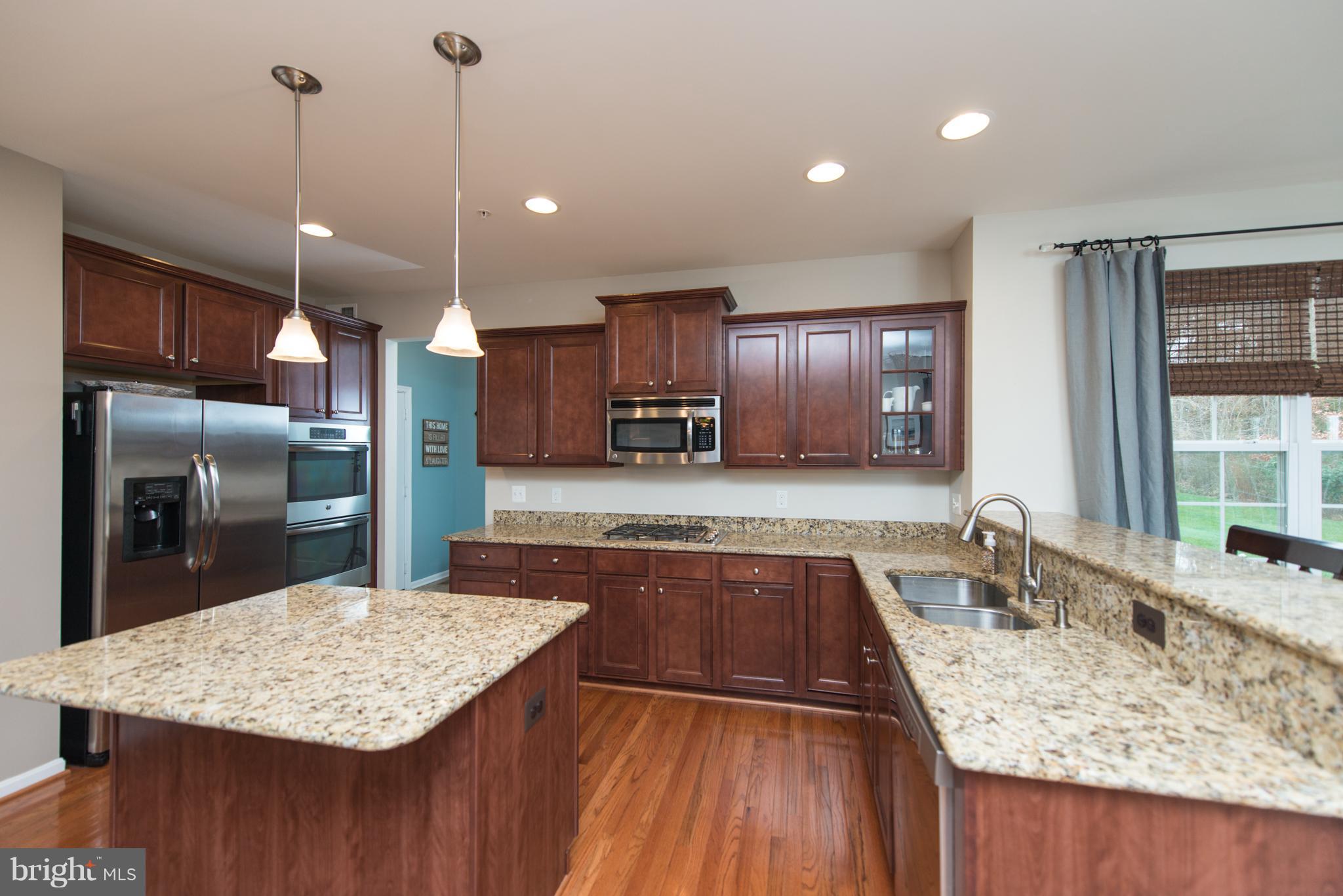 1213 Bradley Road Severn, MD 21144 - Photo 10 of 30 GRANITE GALORE, GAS COOKTOP & DUAL WALL OVENS