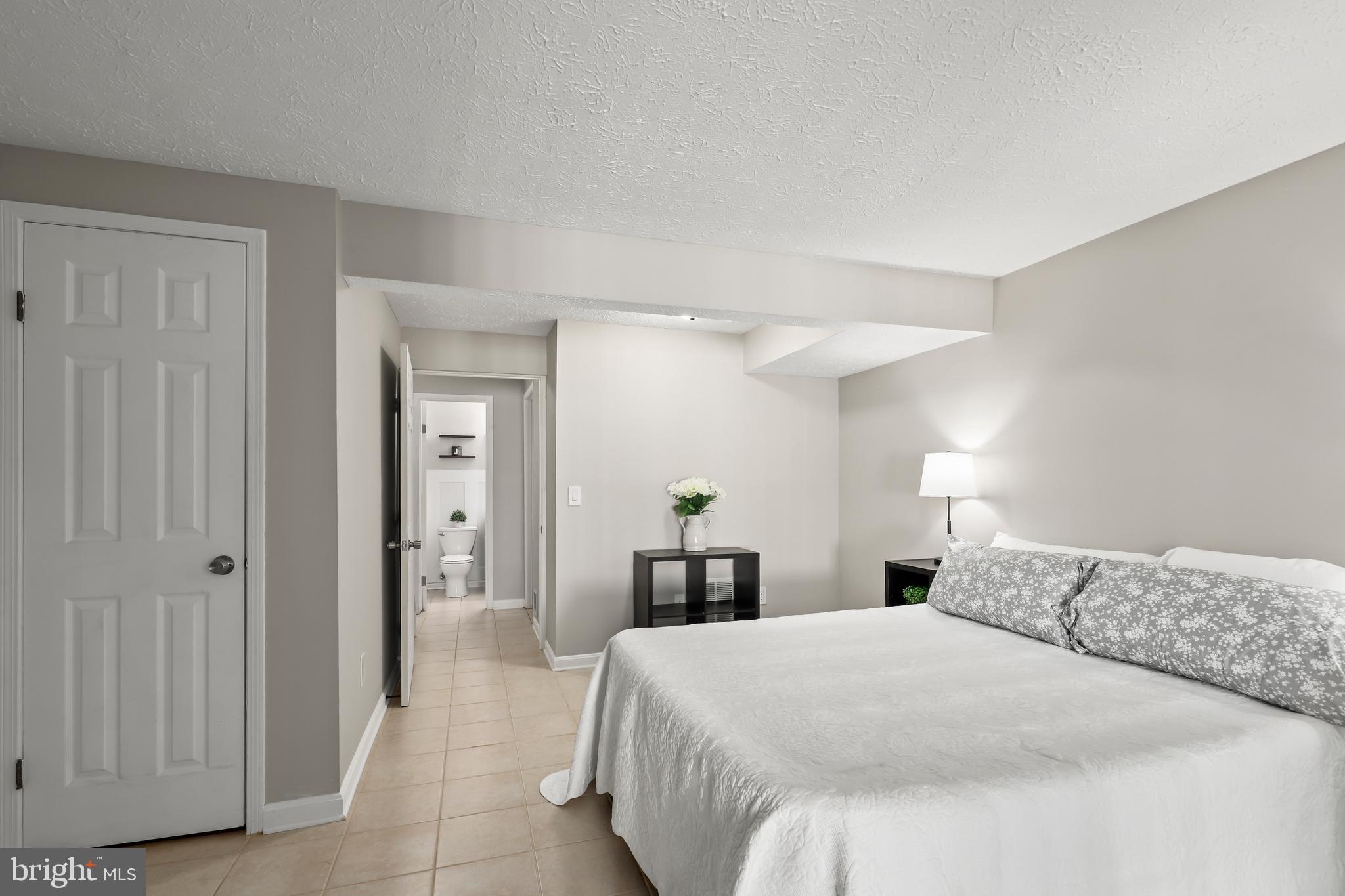 1937 Belmont Ridge Court Reston, VA 20191 - Photo 17 of 23 a bedroom with a bed and a closet