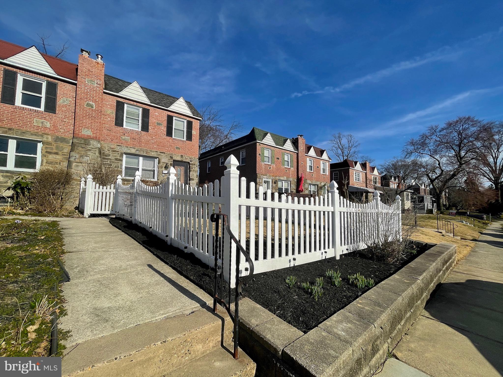 59 Greenhill Road Media, PA 19063 - Photo 2 of 52 Front Flower bed w/ retaining wall & walkway