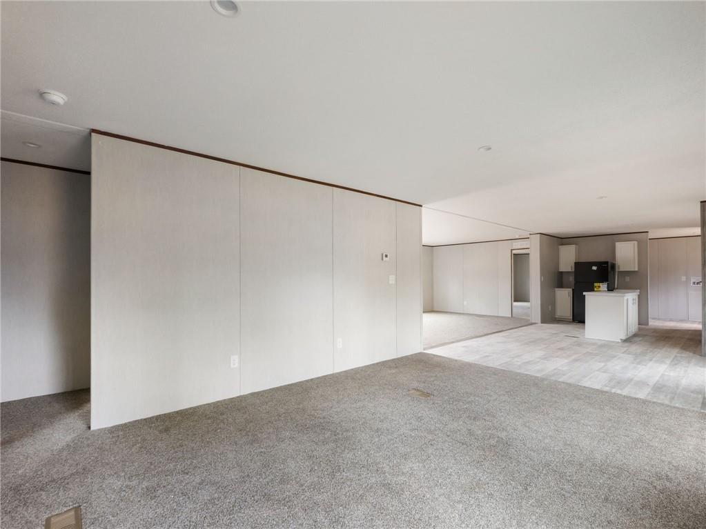 5226 Bogus Road Commerce, GA 30530 - Photo 15 of 41 a view of empty room with a kitchen