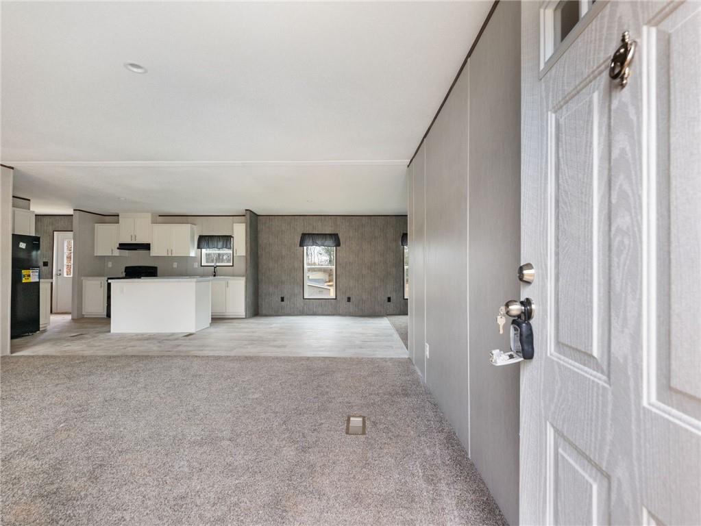5226 Bogus Road Commerce, GA 30530 - Photo 2 of 41 a view of a kitchen with a refrigerator and a window