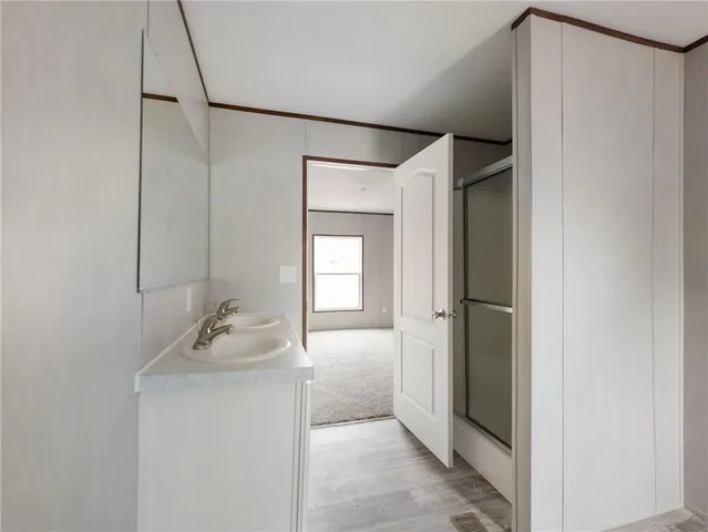 a view of a room with racks on the wall