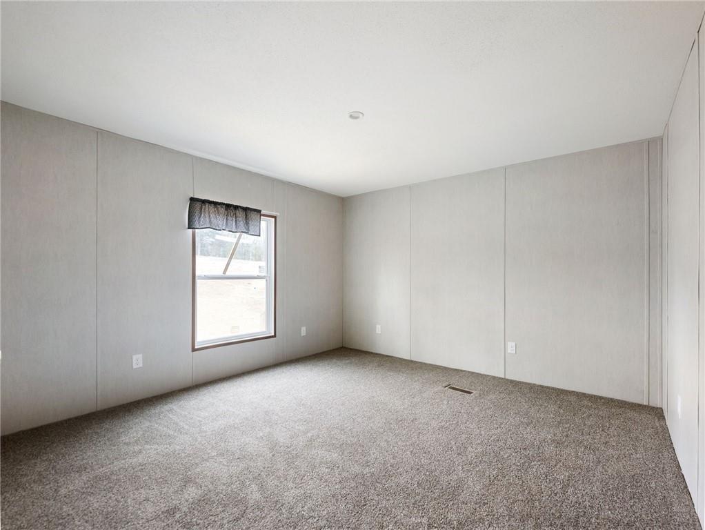 5226 Bogus Road Commerce, GA 30530 - Photo 25 of 41 an empty room with windows