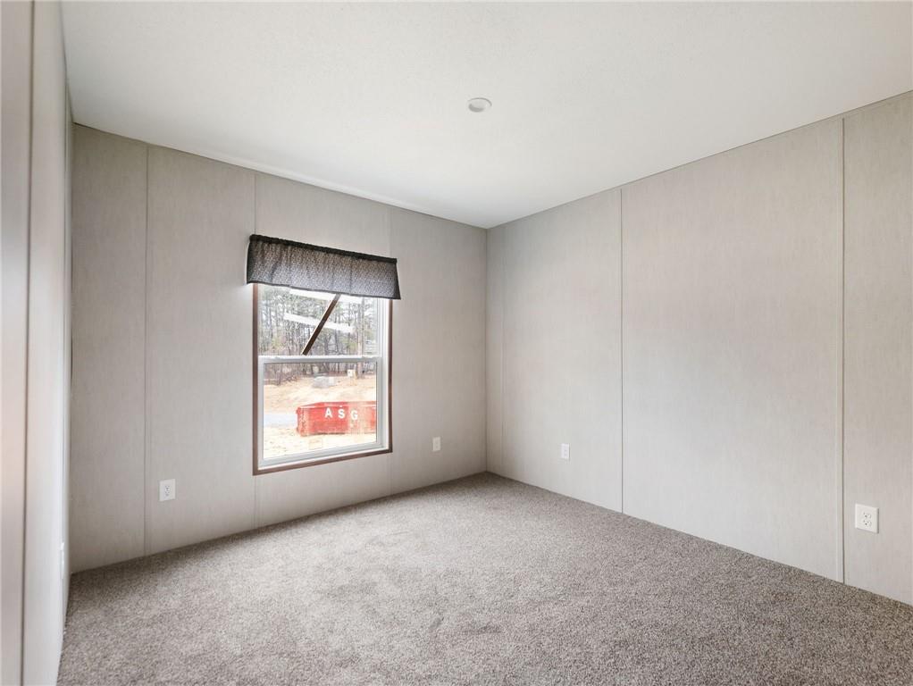 5226 Bogus Road Commerce, GA 30530 - Photo 29 of 41 a view of an empty room with windows