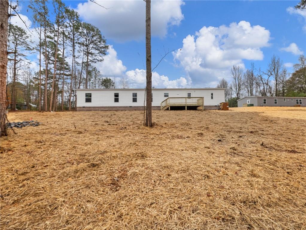 5226 Bogus Road Commerce, GA 30530 - Photo 38 of 41 a bathroom with a sink and a yard